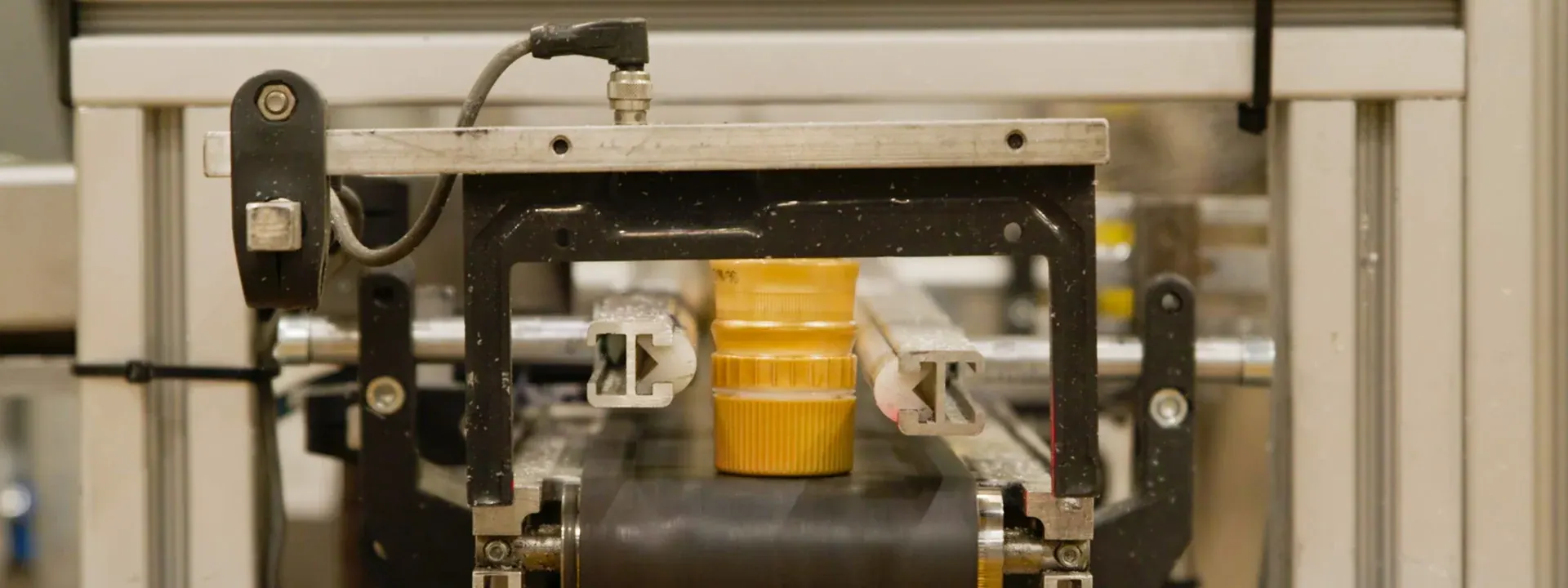 Closure manufacturing line inside a production plant